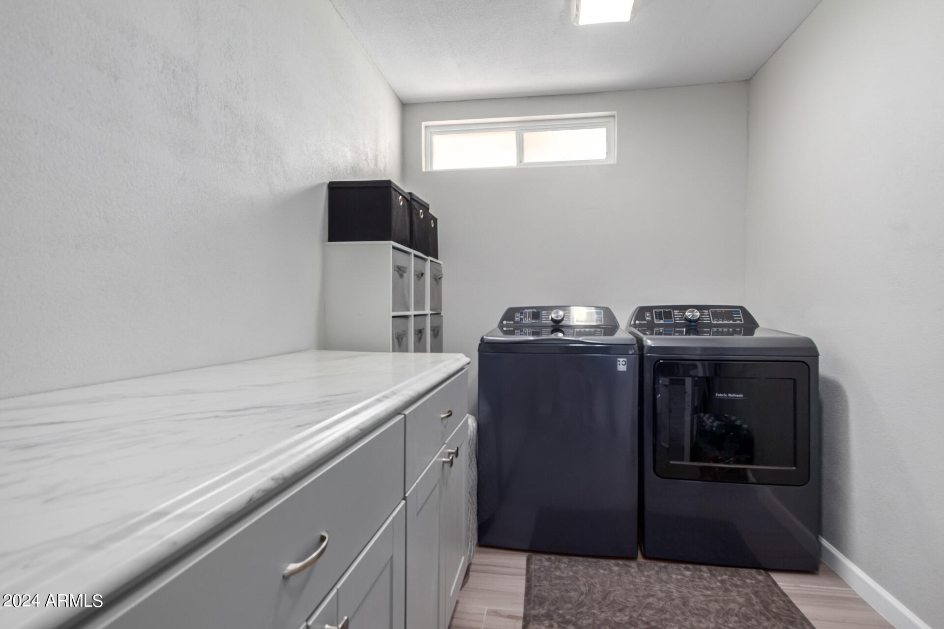 3216 West Hearn Road Phoenix, AZ 85053 - Photo 26 of 32 a utility room with dryer and washer