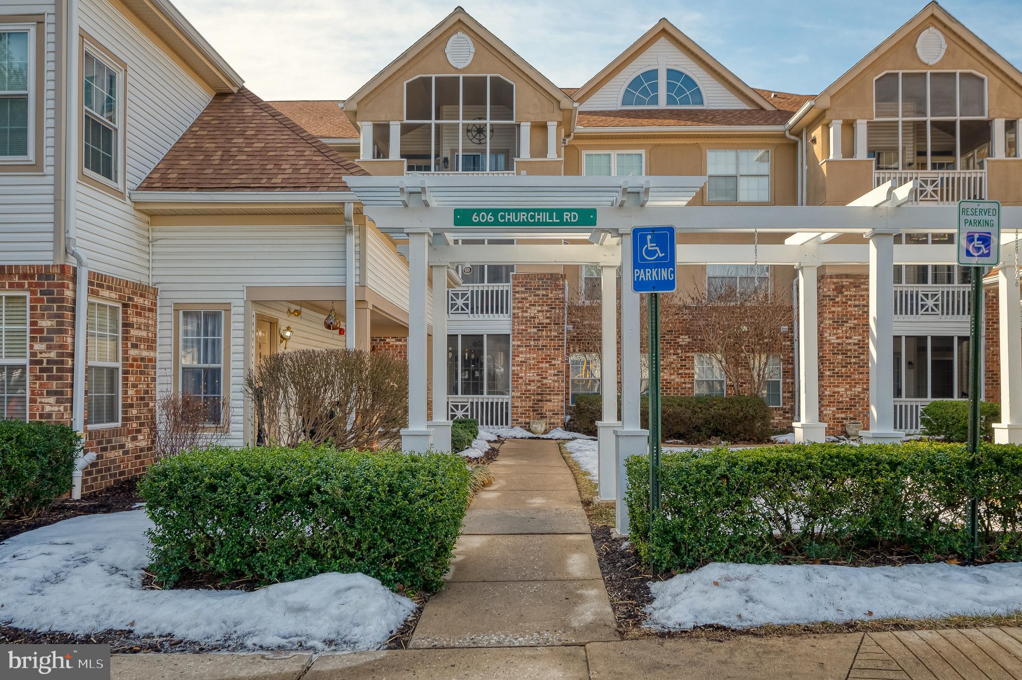 606 Churchill Road, Unit E Bel Air, MD 21014 - Photo 1 of 29 a front view of a building with garden