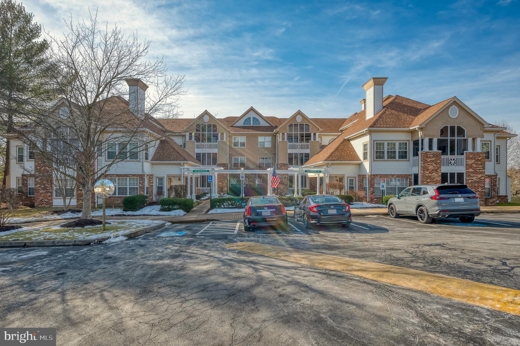 606 Churchill Road, Unit E Bel Air, MD 21014 - Photo 2 of 29 a car parked in front of a house