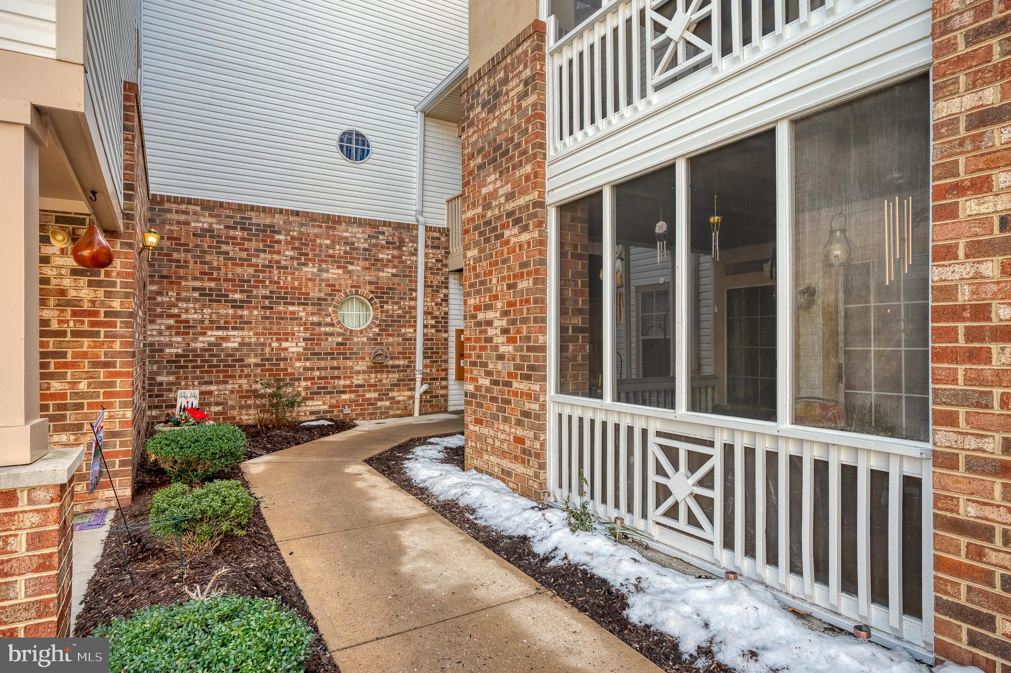 606 Churchill Road, Unit E Bel Air, MD 21014 - Photo 7 of 29 a view of a house with a small yard and wooden floor and fence