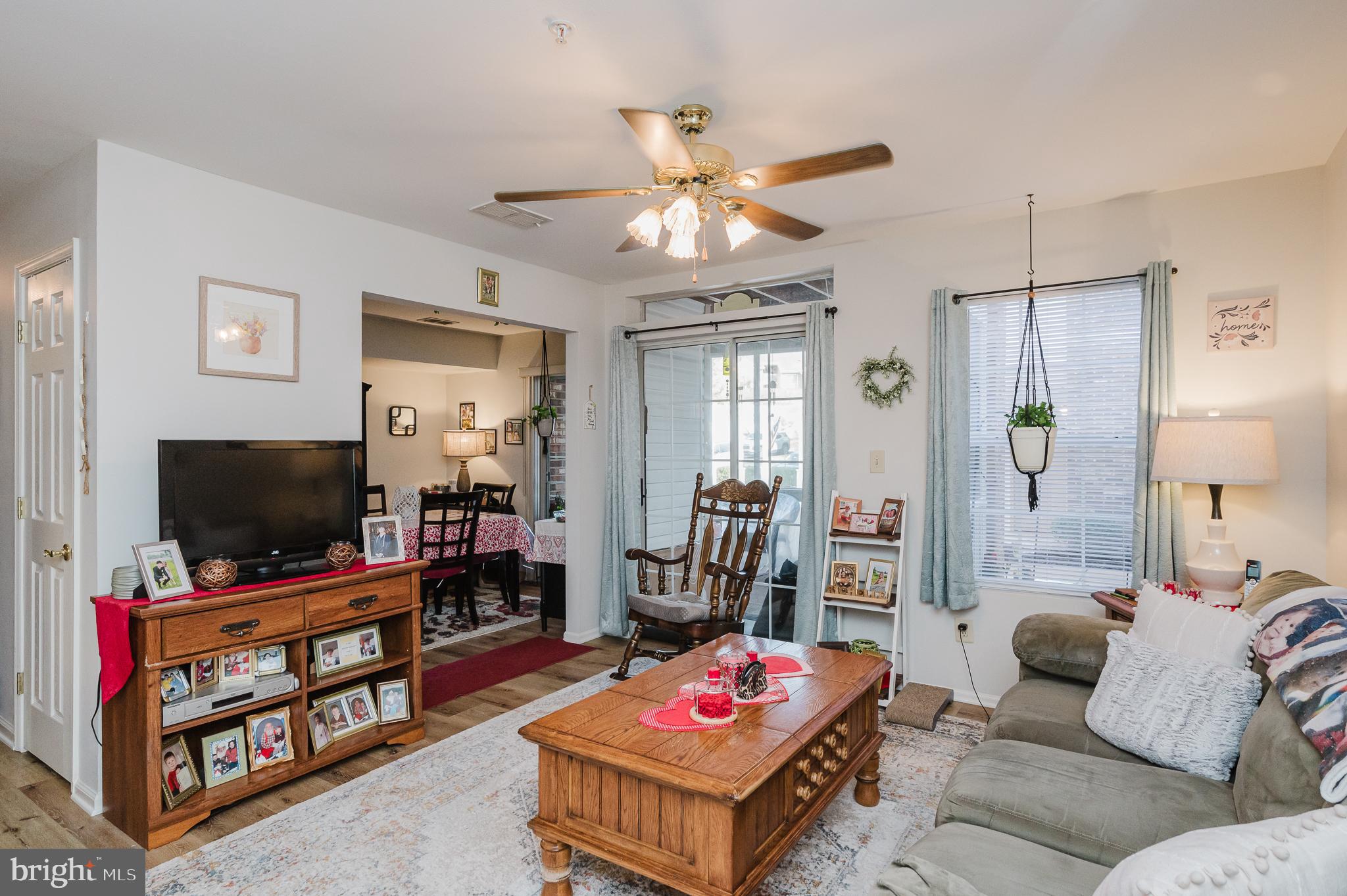 606 Churchill Road, Unit E Bel Air, MD 21014 - Photo 9 of 29 a living room with furniture and a flat screen tv