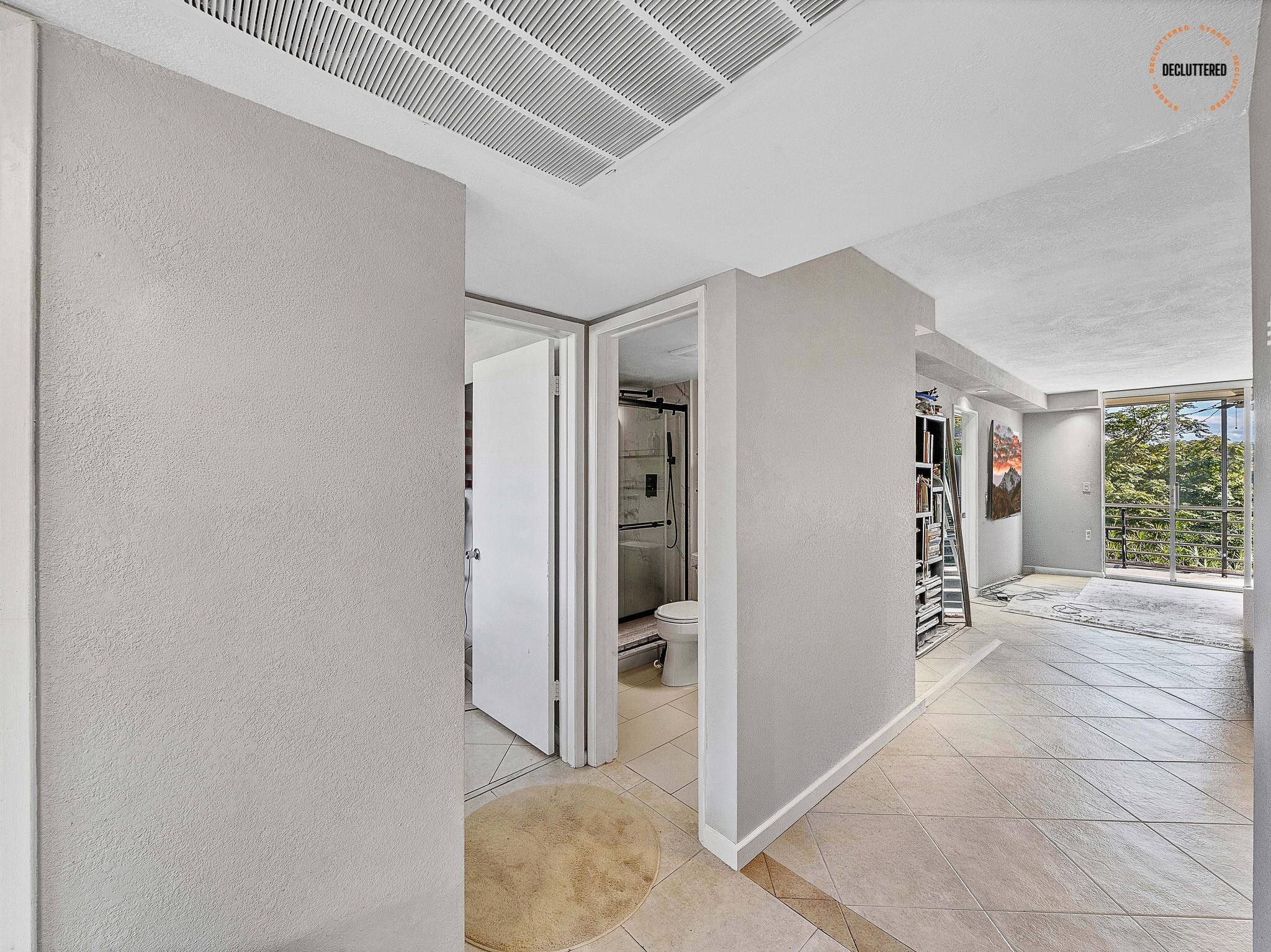 4500 North Federal Highway, Unit 303 Lighthouse Point, FL 33064 - Photo 11 of 40 a view of livingroom with furniture and windows