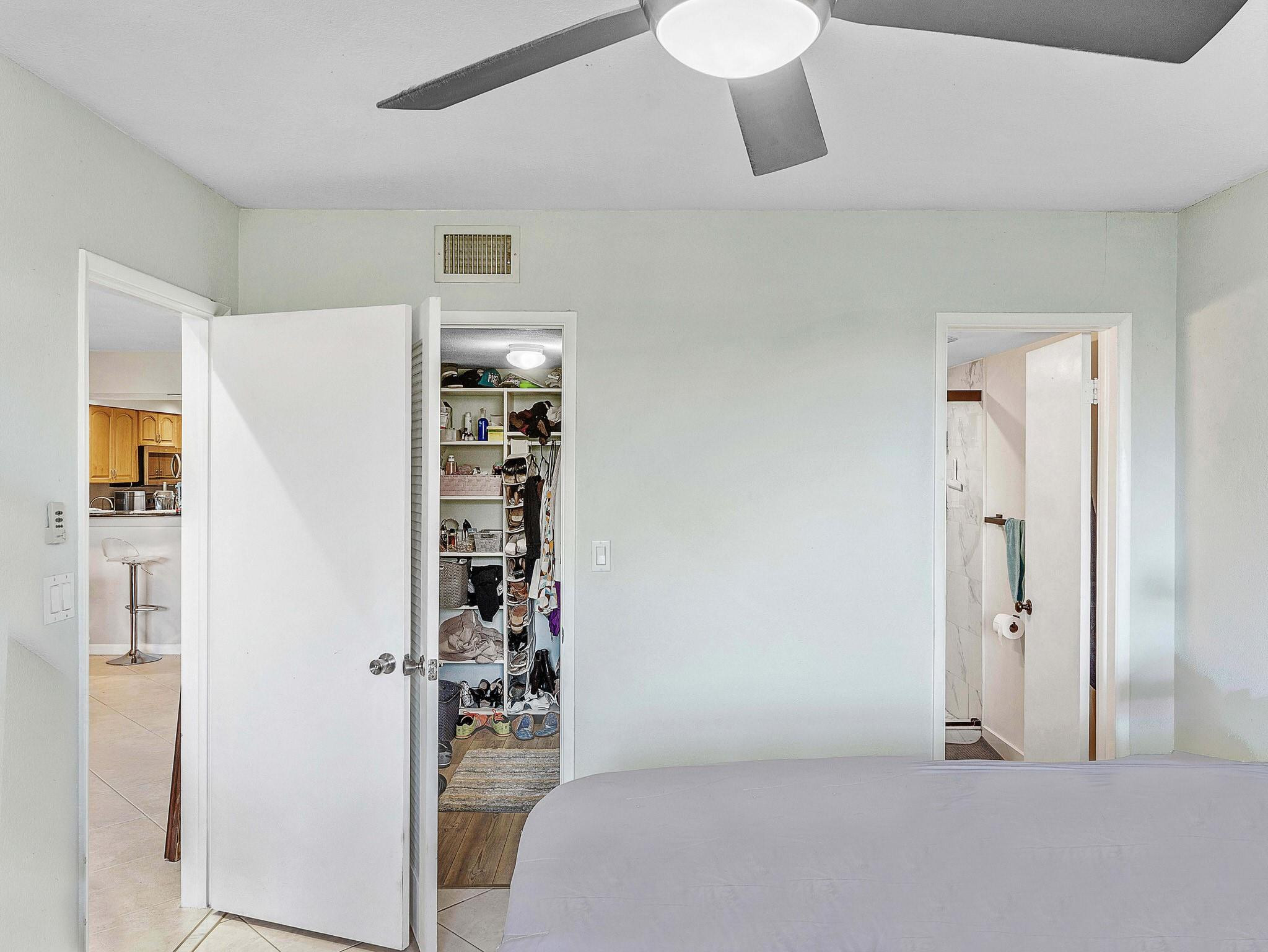 4500 North Federal Highway, Unit 303 Lighthouse Point, FL 33064 - Photo 26 of 40 a bedroom with closet