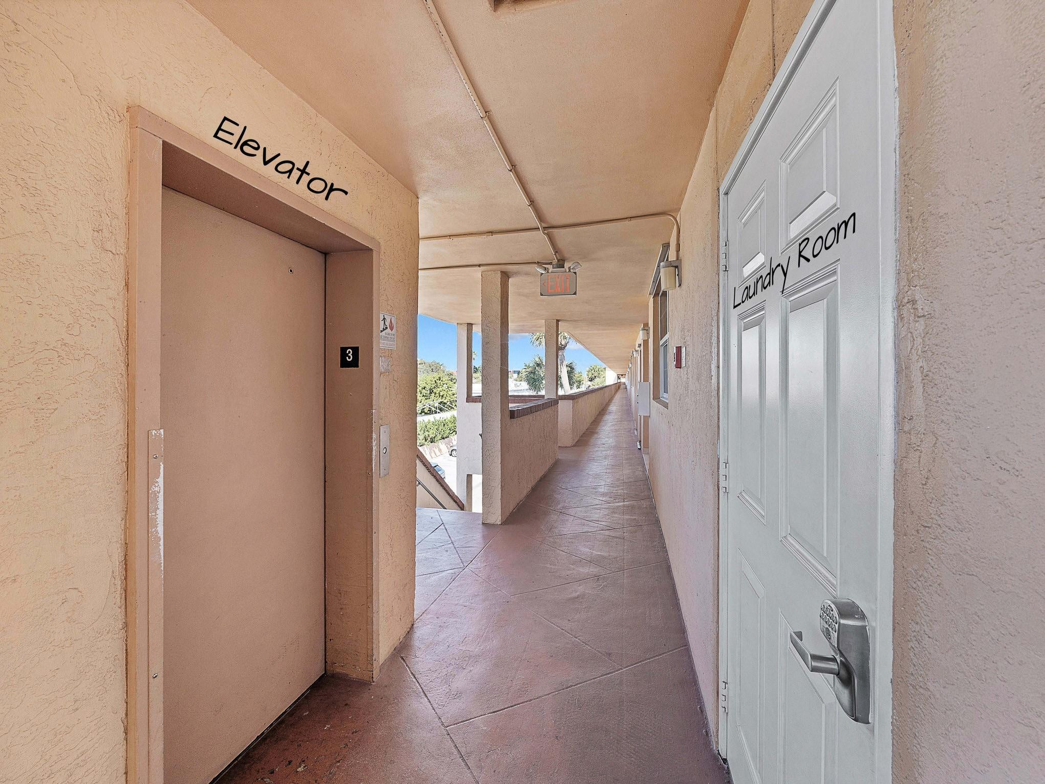 4500 North Federal Highway, Unit 303 Lighthouse Point, FL 33064 - Photo 32 of 40 a view of a hallway