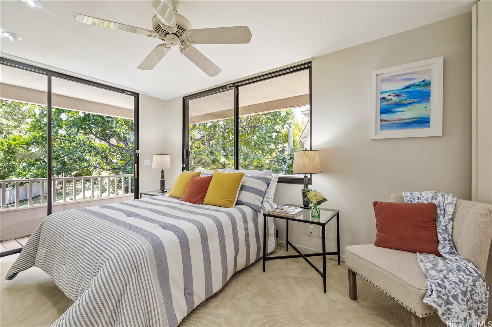 2929 Poni Moi Road, Unit 4 Honolulu, HI 96815 - Photo 20 of 25 a bedroom with a bed couch and a large window