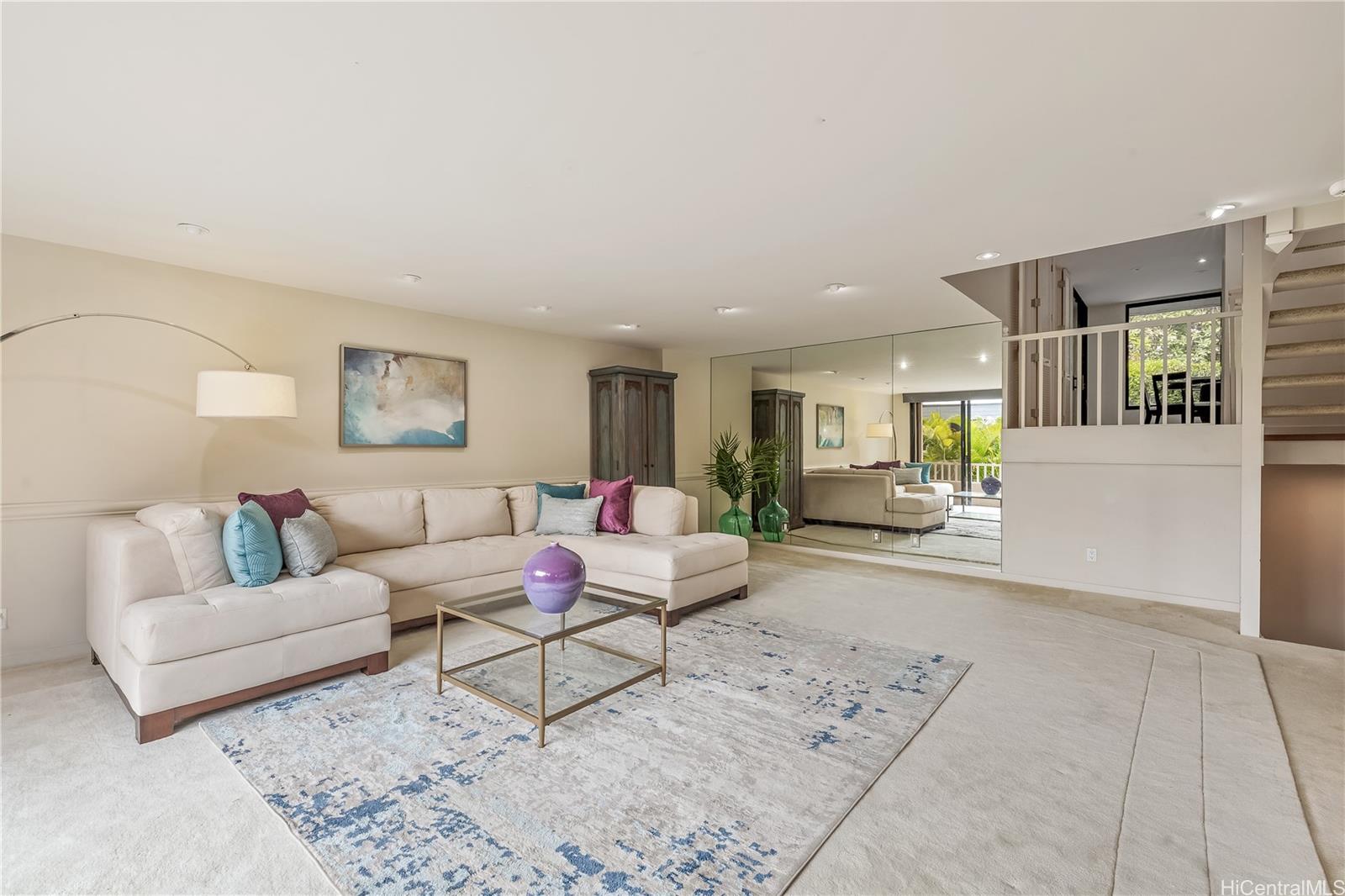 2929 Poni Moi Road, Unit 4 Honolulu, HI 96815 - Photo 4 of 25 a living room with furniture and wooden floor