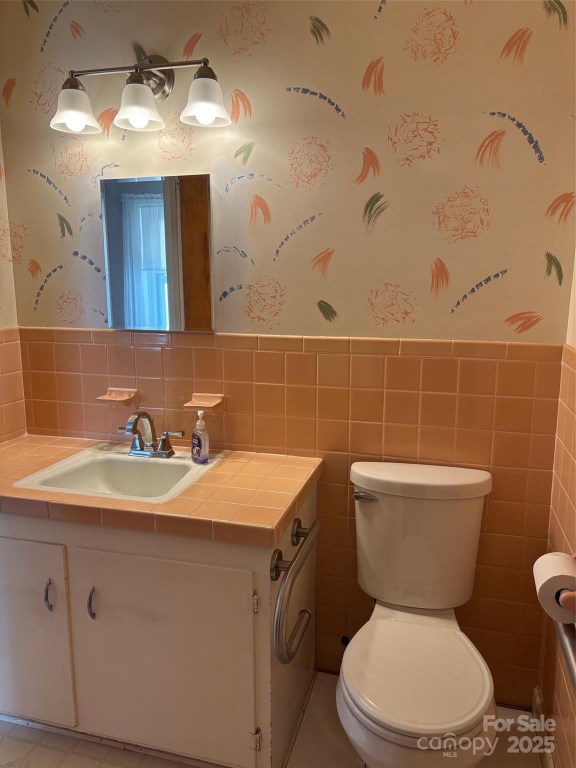 150 Old Georgia Road Statesville, NC 28625 - Photo 19 of 42 a bathroom with a toilet sink and mirror