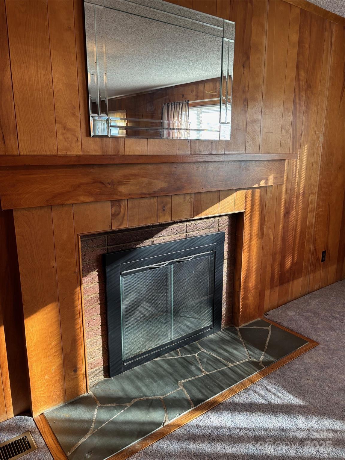 150 Old Georgia Road Statesville, NC 28625 - Photo 6 of 42 a living room with a fireplace
