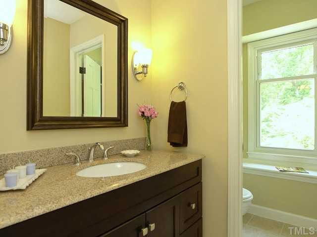 601 Ted Avenue Raleigh, NC 27614 - Photo 14 of 24 Master bath updated with new cabinet vanity, granite, paint, and flooring. Master Bath/Spa