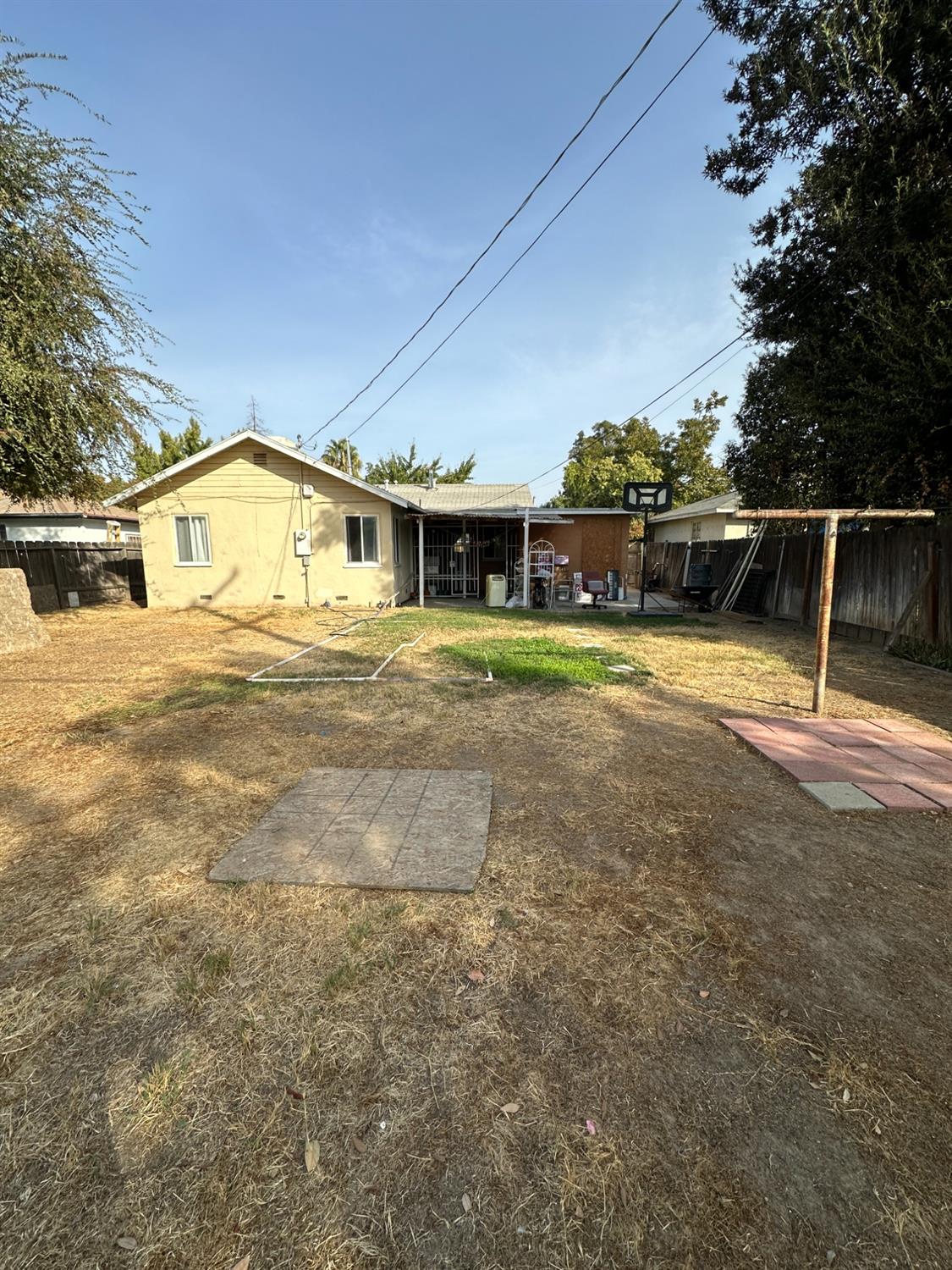 915 West Fountain Way Fresno, CA 93705 - Photo 20 of 20 a view of residential houses with yard and swimming pool