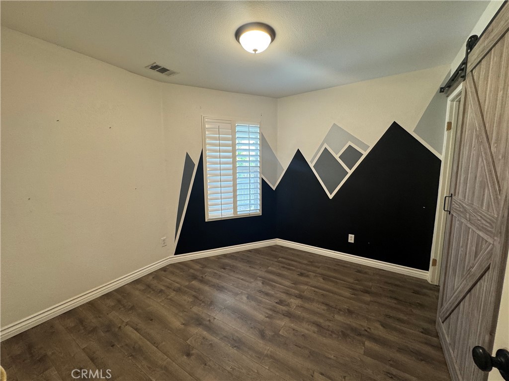 1517 Marigold Drive Perris, CA 92571 - Photo 10 of 47 an empty room with windows