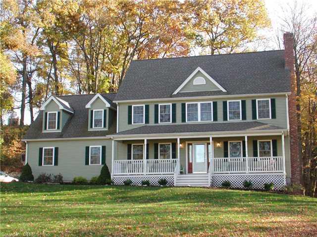 399 Chamberlain Road Middletown, CT 06457 - Photo 1 of 1 a front view of a house with a yard