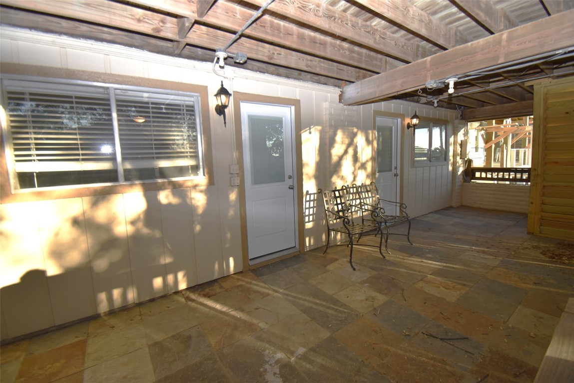 82 Harbor Lane Kemah, TX 77565 - Photo 32 of 33 a view of an empty room with windows