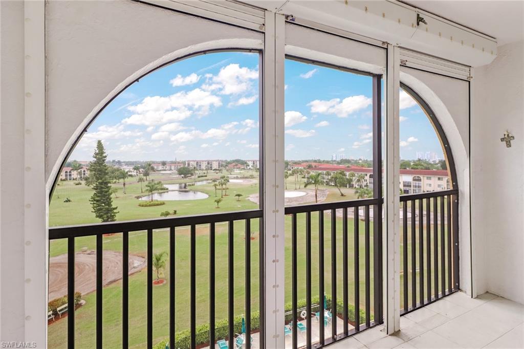 21 High Point Circle East, Unit 601 Naples, FL 34103 - Photo 22 of 22 a view of a city from a balcony