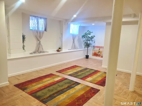 a living room with a rug