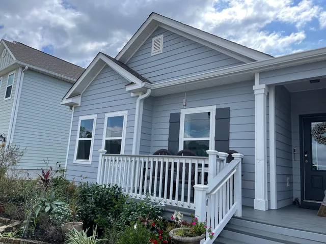 a view of a house with deck and deck