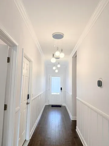 a bathroom with a granite countertop sink a shower and a mirror