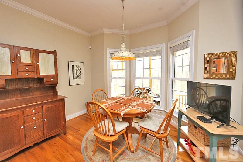 114 Bynum Ridge Road Pittsboro, NC 27312 - Photo 12 of 23 The breakfast area just off the kitchen is ideal for more casual dining.