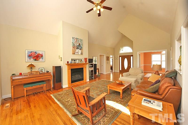 114 Bynum Ridge Road Pittsboro, NC 27312 - Photo 13 of 23 Another view of the spacious family room and the second gas log fireplace.