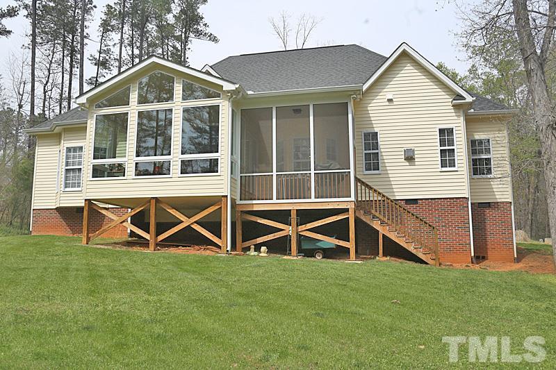 114 Bynum Ridge Road Pittsboro, NC 27312 - Photo 15 of 23 The sun room faces south in order to capture light and provide additional warmth on cooler days. The screened porch is smaller but just as useful on beautiful spring and fall days.