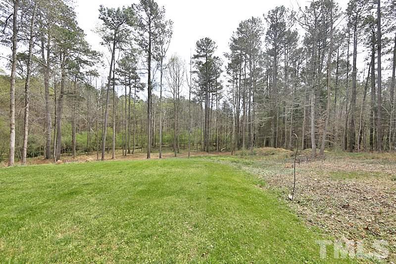114 Bynum Ridge Road Pittsboro, NC 27312 - Photo 16 of 23 Just over two acres provide privacy and the opportunity to see turkeys, foxes, deer and other wildlife. The lot has just the right balance of cleared and wooded areas and there is even space for vegetable and flower gardens.