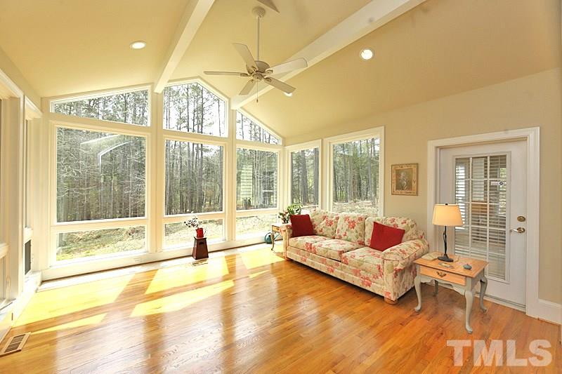 114 Bynum Ridge Road Pittsboro, NC 27312 - Photo 4 of 23 The sun room even sports a tile strip next to the picture windows for growing and maintaining a variety of indoor plants.