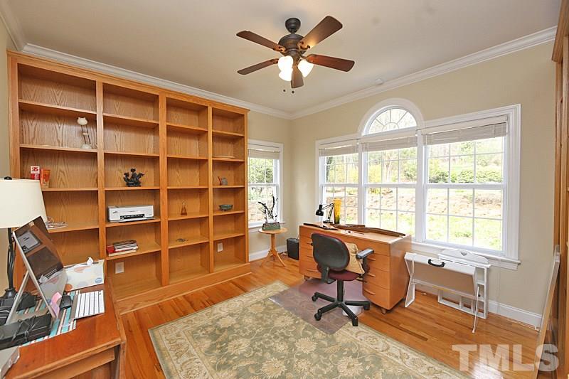 114 Bynum Ridge Road Pittsboro, NC 27312 - Photo 9 of 23 This elegant office/study features custom built-in oak bookshelves.