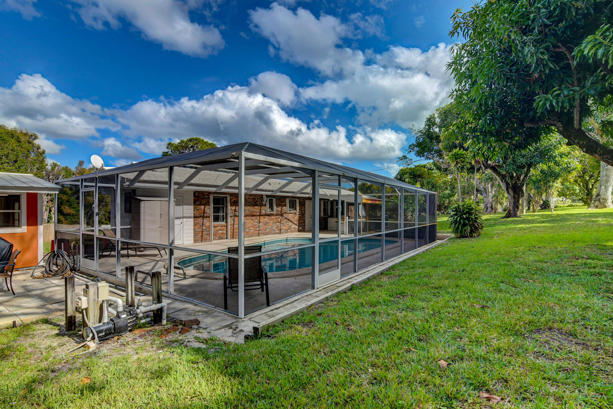 6465 High Ridge Road Lake Worth, FL 33462 - Photo 36 of 51 6465 High Ridge Screened in Patio
