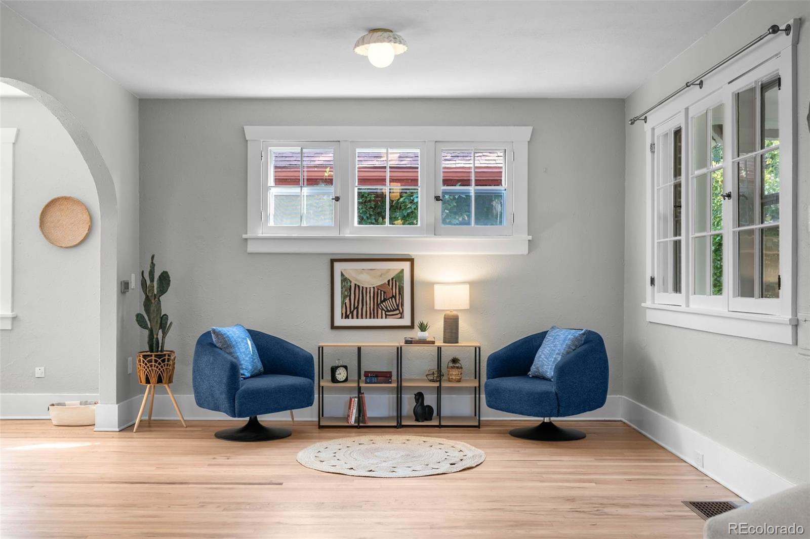 2314 Grape Street Denver, CO 80207 - Photo 11 of 49 a living room with furniture and a window