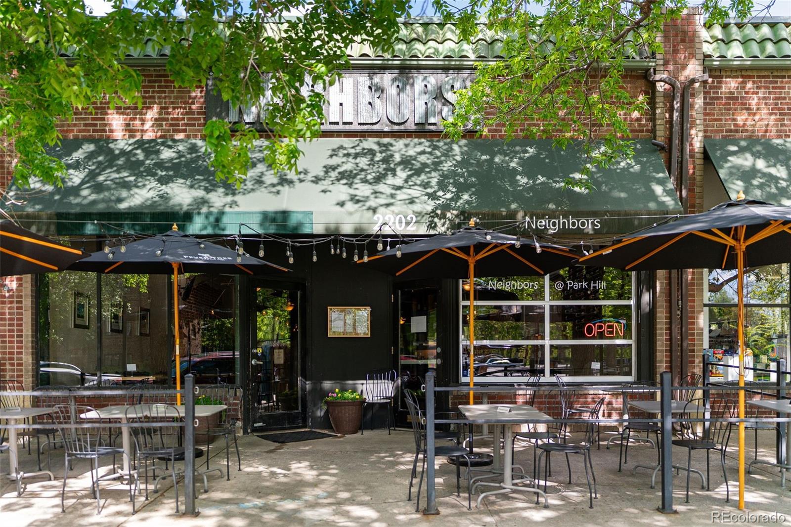 2314 Grape Street Denver, CO 80207 - Photo 40 of 49 a view of a chairs and table in patio