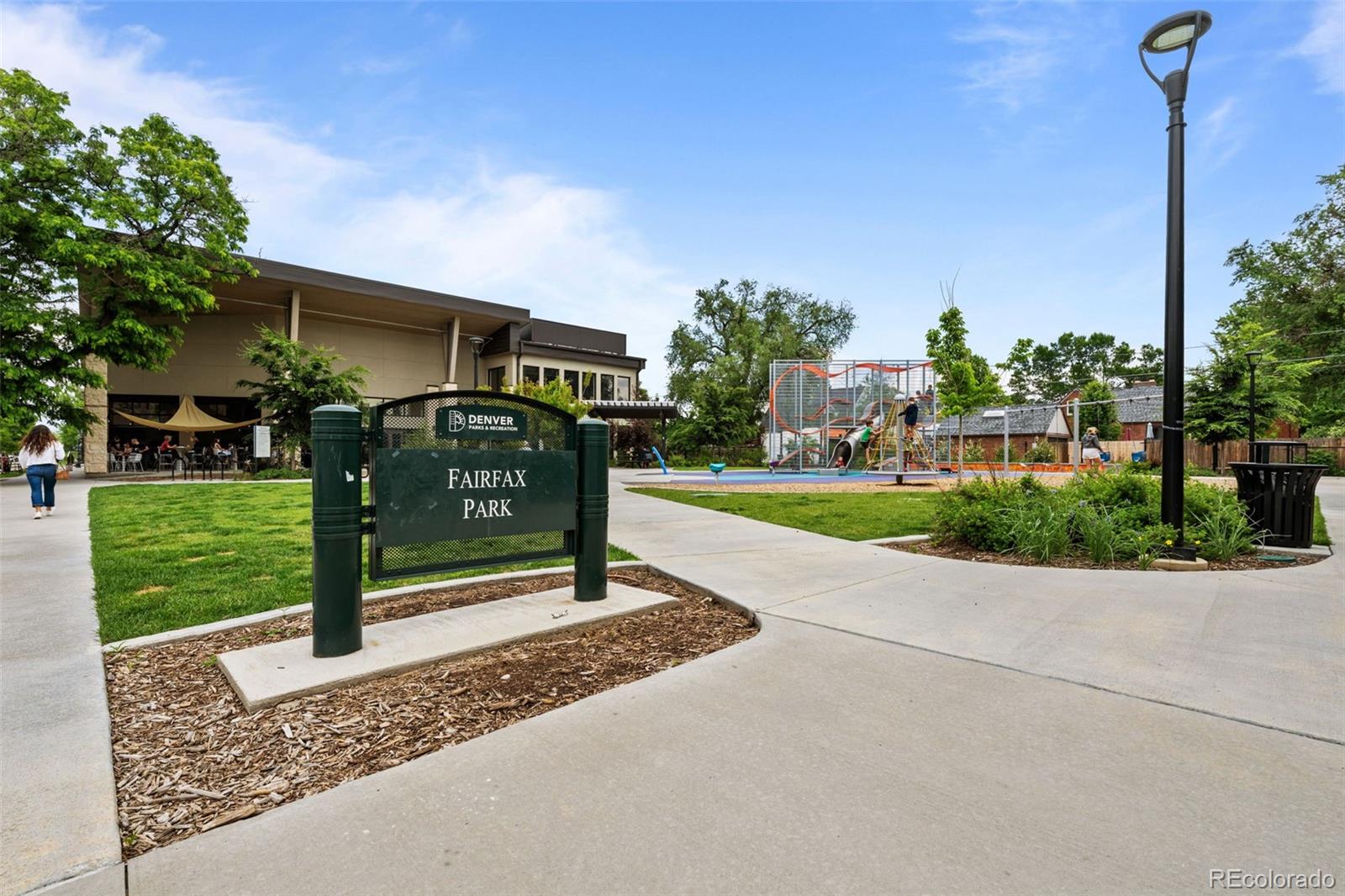 2314 Grape Street Denver, CO 80207 - Photo 44 of 49 a front view of a house with a yard