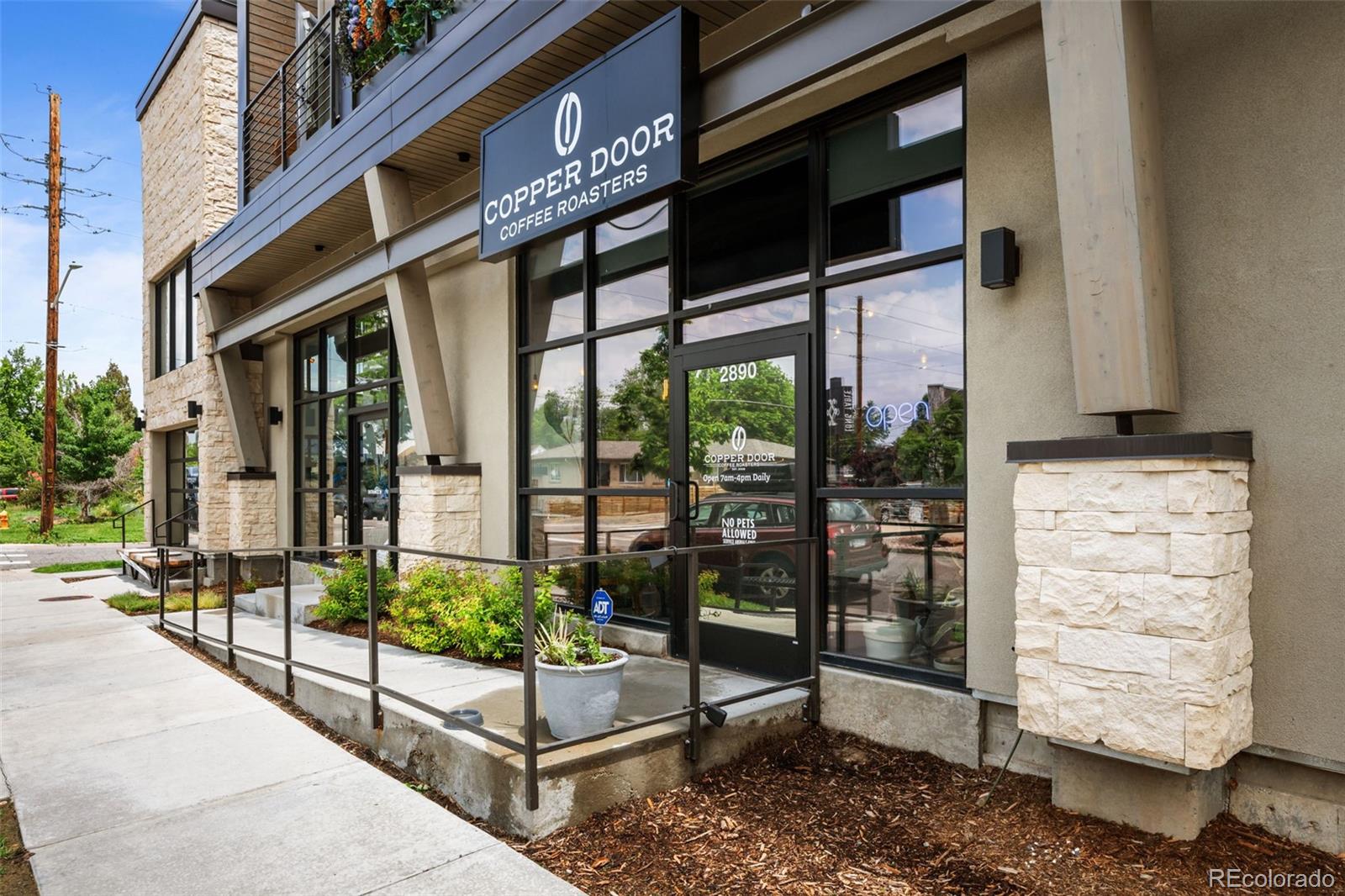 2314 Grape Street Denver, CO 80207 - Photo 47 of 49 a view of a porch with furniture
