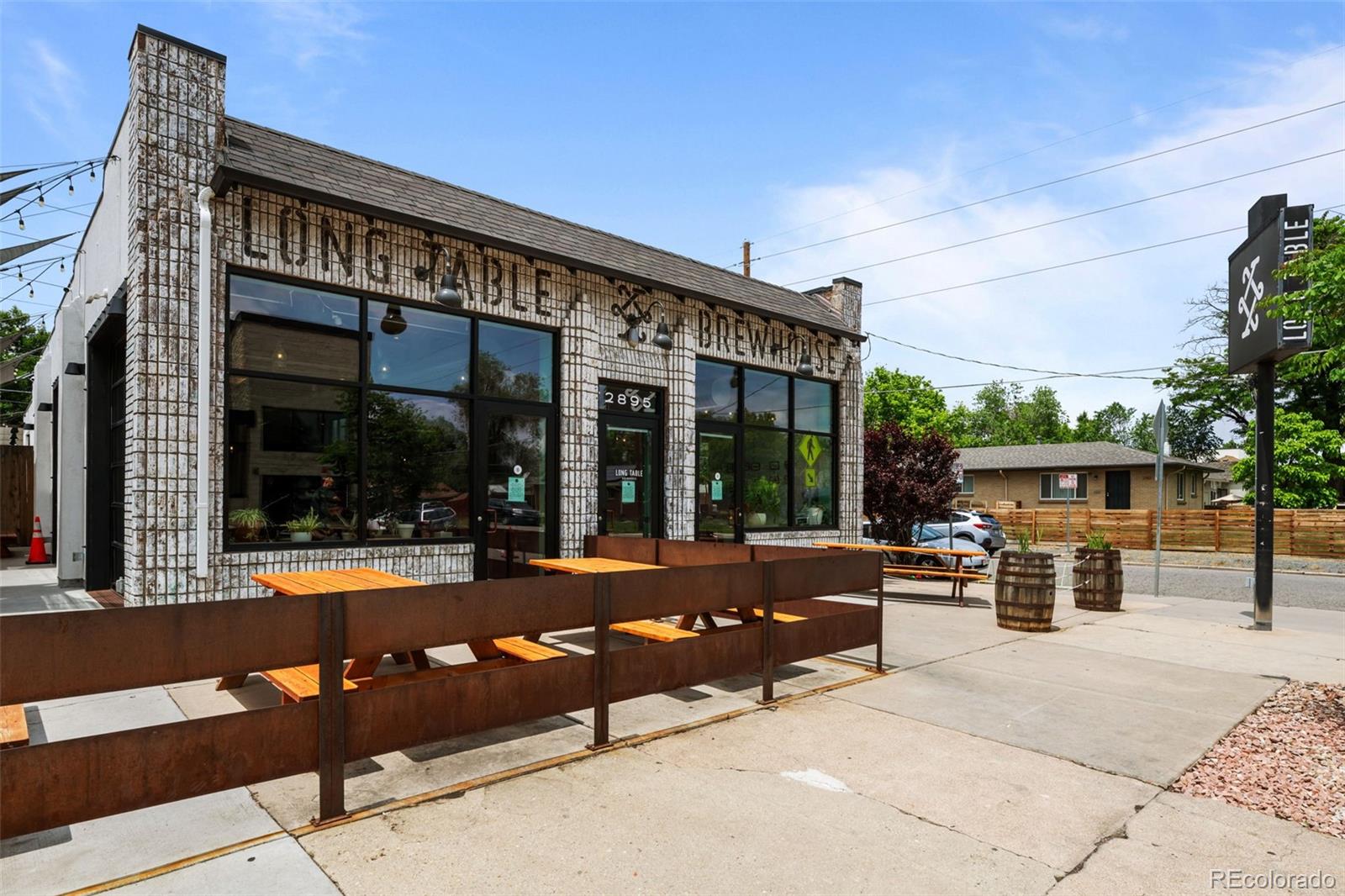 2314 Grape Street Denver, CO 80207 - Photo 48 of 49 a view of a house with sitting area and roof