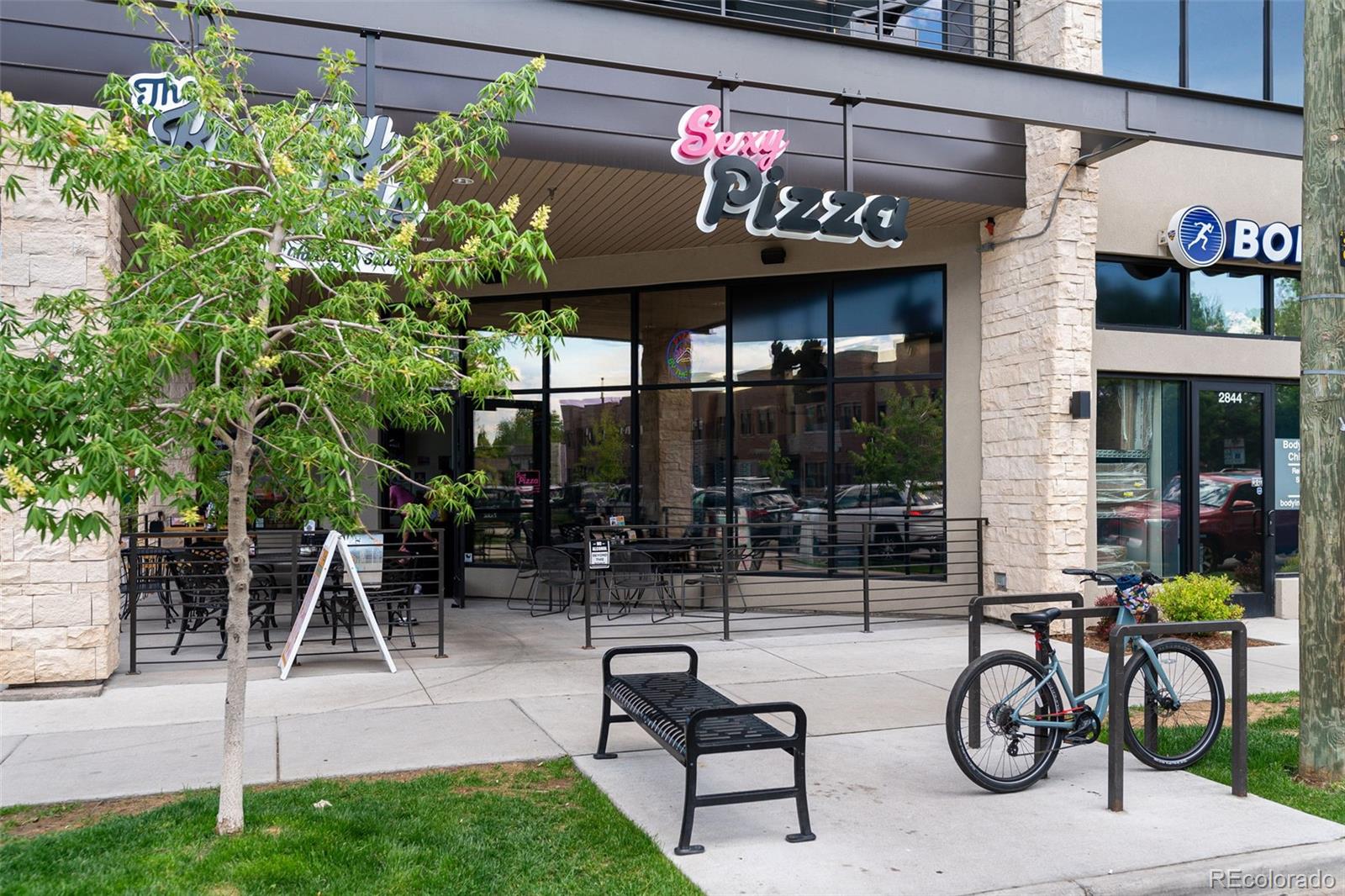 2314 Grape Street Denver, CO 80207 - Photo 49 of 49 a view of a chairs and table in a patio