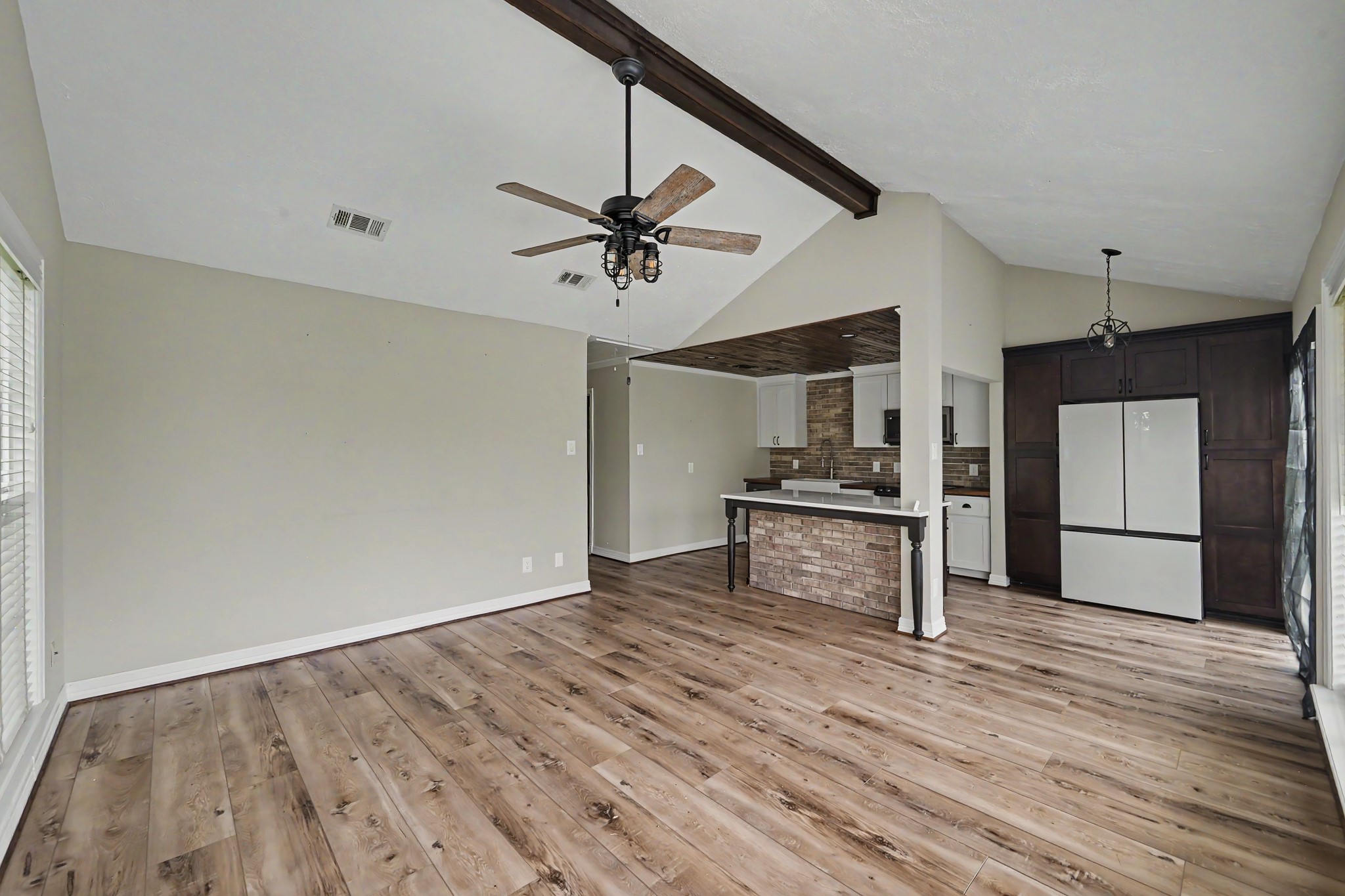 41 Driving Range Lane Trinity, TX 75862 - Photo 13 of 21 Living room and kitchen flow together.