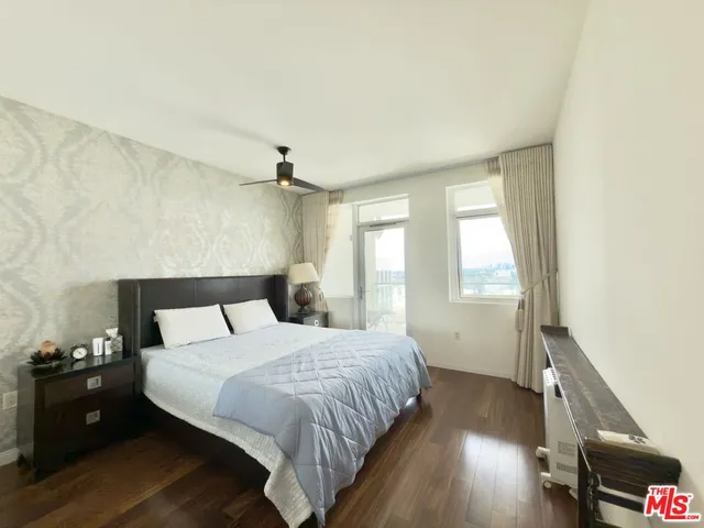 a room with a window and a chair