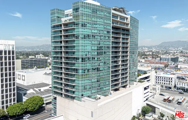 a front view of a building with a yard