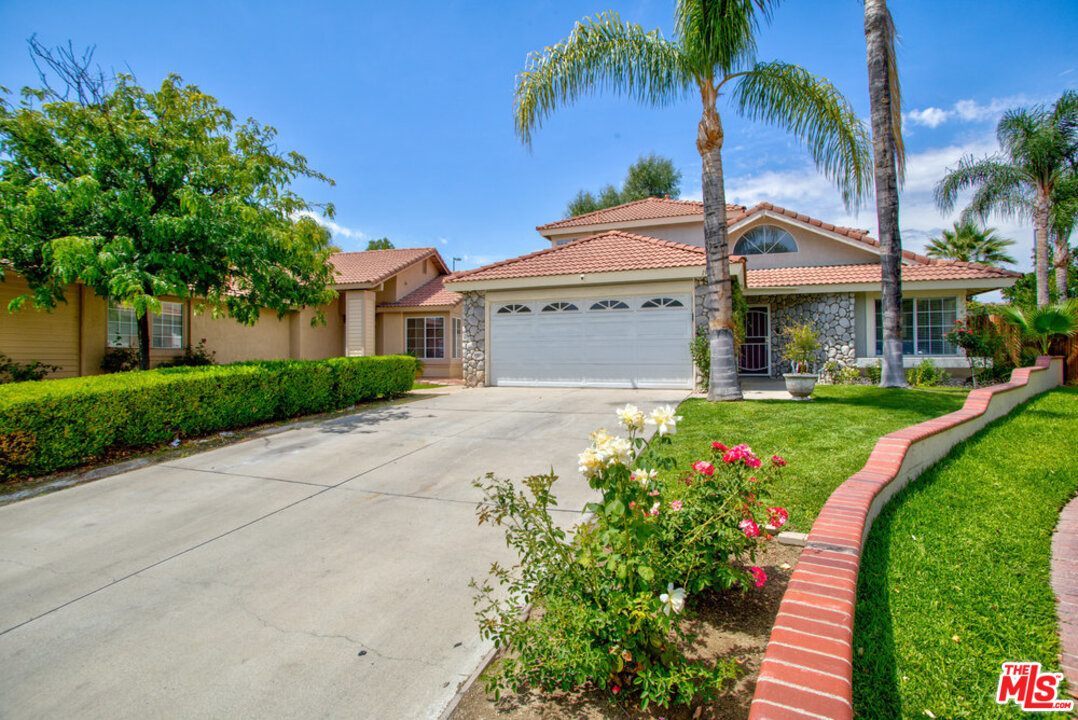 19281 Foxtail Lane Riverside, CA 92508 - Photo 3 of 53 a front view of house with yard and green space