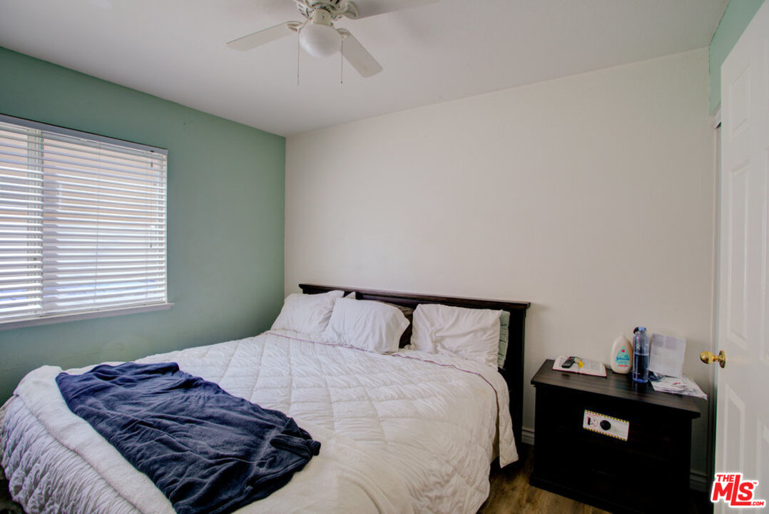 19281 Foxtail Lane Riverside, CA 92508 - Photo 29 of 53 a bedroom with a bed and window
