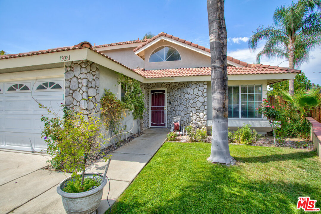19281 Foxtail Lane Riverside, CA 92508 - Photo 5 of 53 a front view of a house with garden