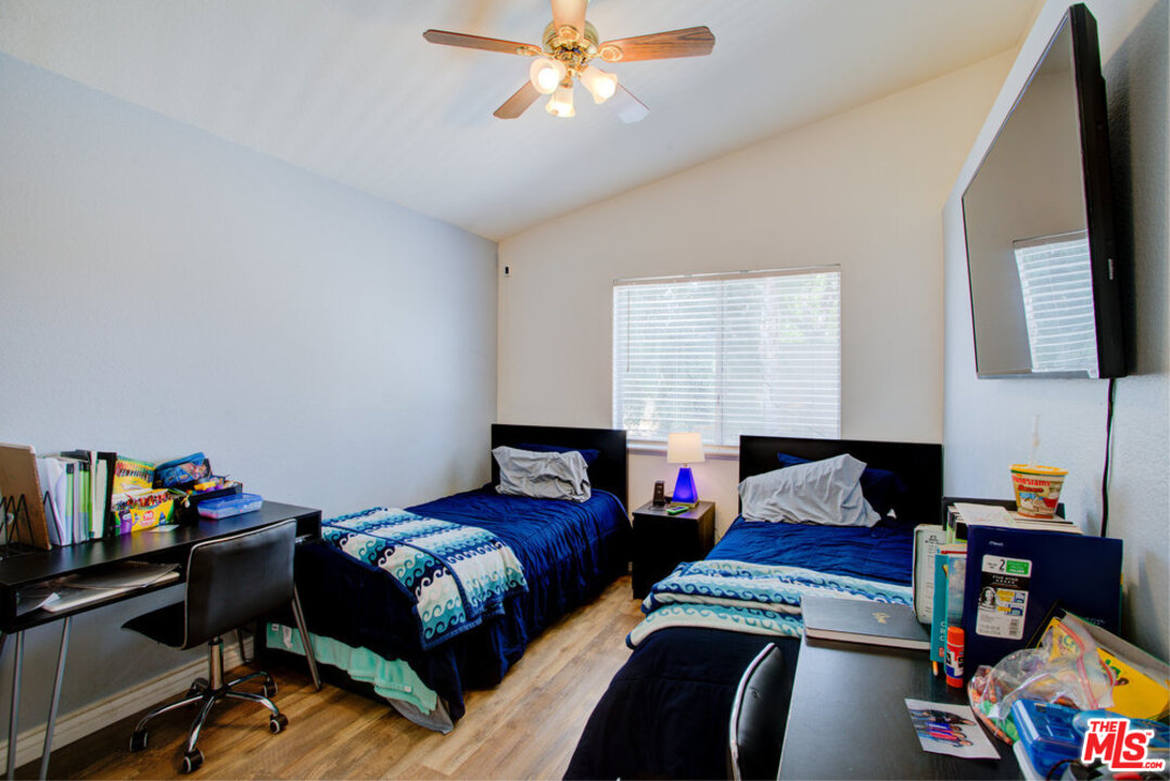19281 Foxtail Lane Riverside, CA 92508 - Photo 43 of 53 a bedroom with furniture and a window