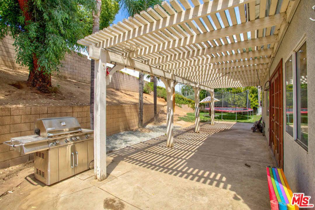 19281 Foxtail Lane Riverside, CA 92508 - Photo 46 of 53 a building with glass door