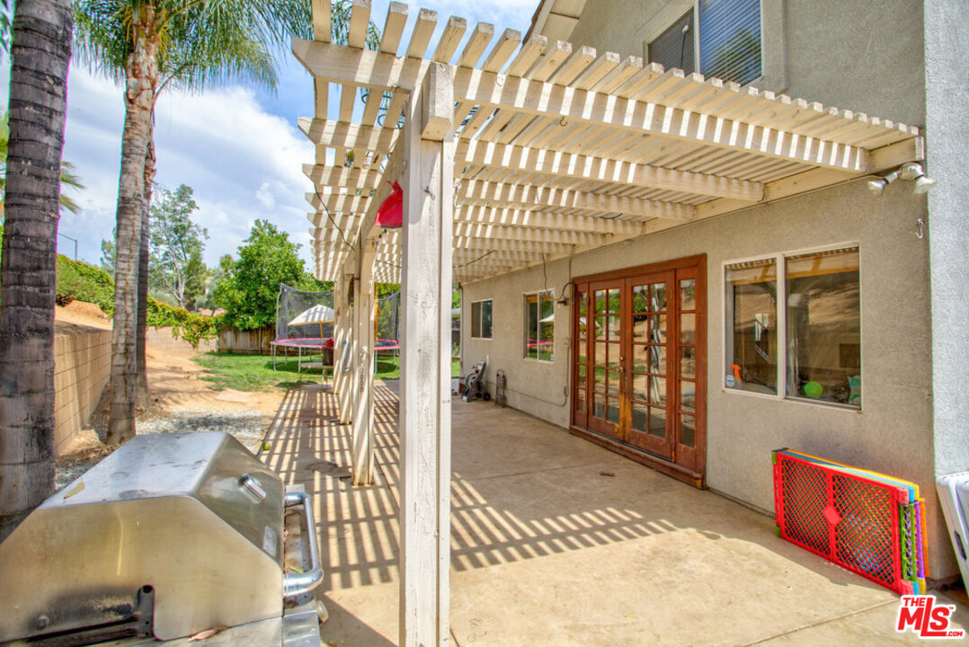 19281 Foxtail Lane Riverside, CA 92508 - Photo 47 of 53 a view of a house with backyard and sitting area