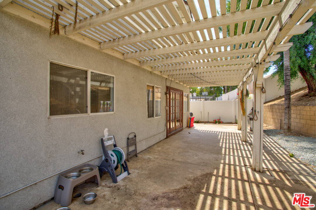 19281 Foxtail Lane Riverside, CA 92508 - Photo 50 of 53 a view of a porch with wooden floor