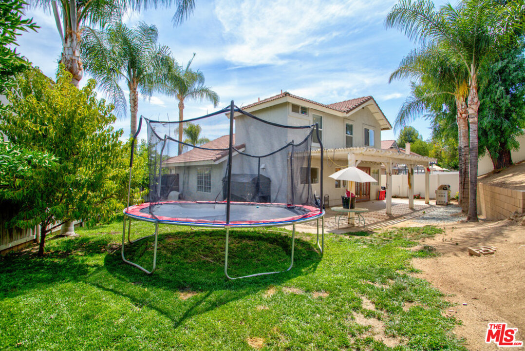 19281 Foxtail Lane Riverside, CA 92508 - Photo 51 of 53 a view of a house with a yard and sitting area