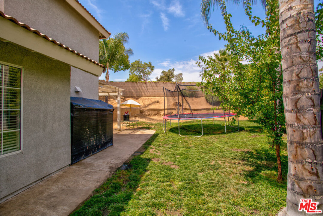19281 Foxtail Lane Riverside, CA 92508 - Photo 53 of 53 a view of a house with a swimming pool