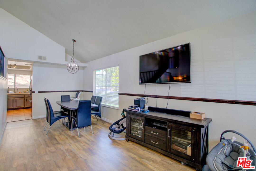 19281 Foxtail Lane Riverside, CA 92508 - Photo 9 of 53 a living room with furniture and a flat screen tv