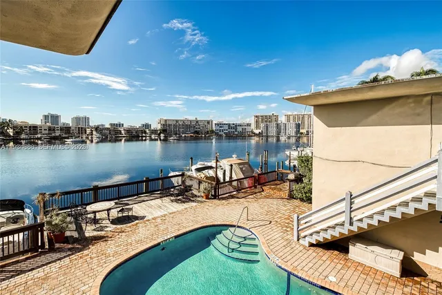 a view of a lake from a balcony