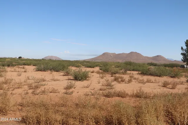 a view of lake with mountain