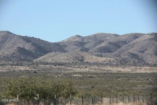 a view of mountain view with mountains in the background